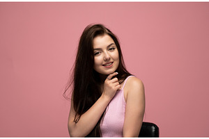 Young woman smiling, looking at, a Person Photo by volodymyrshtun13795