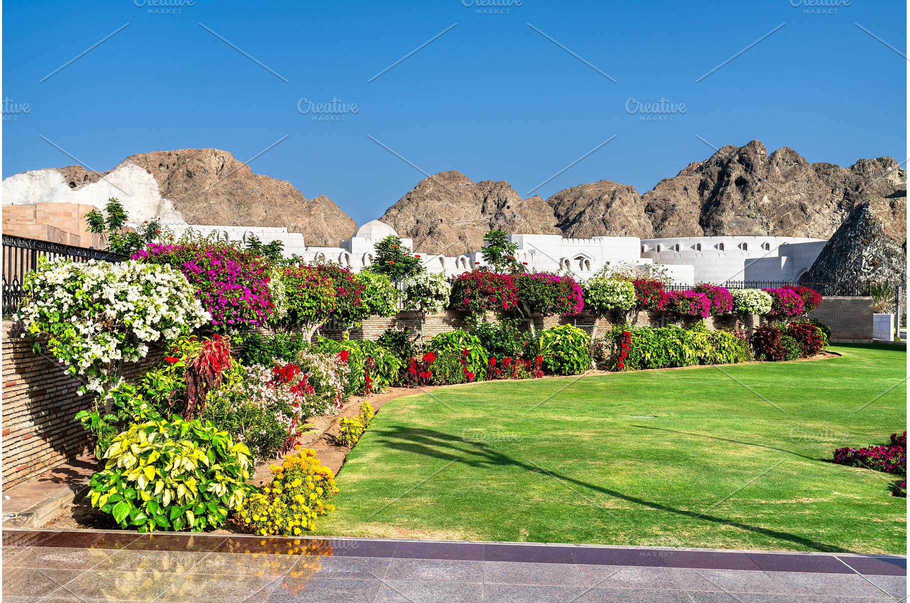 Beautiful gardens of Al Alam Palace, an Architecture Photo by Leonid Andronov