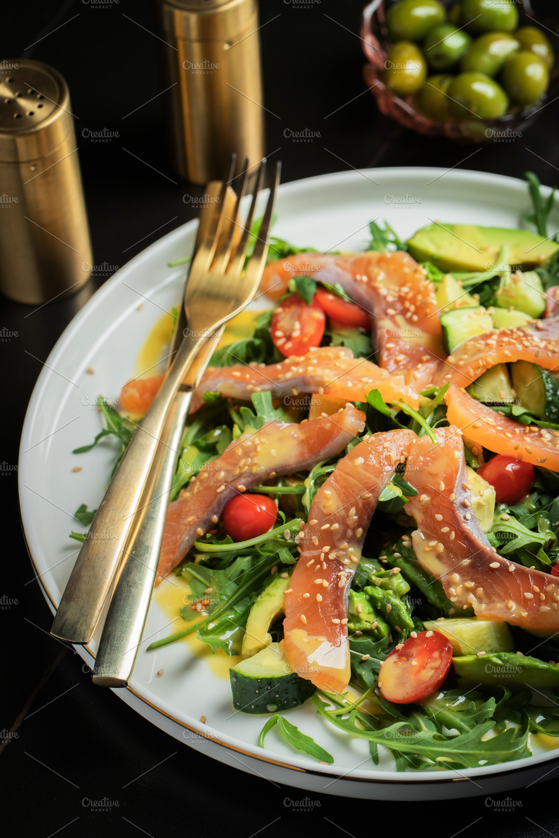 Salad with salted salmon and arugula, a Food & Drink Photo by Budarinphoto