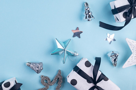 Christmas blue background. Holidays gift box wrapped in blue pap, a Holiday Photo by vimart