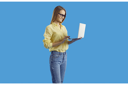 Young woman use computer working, a Technology Photo by StudioRomantic