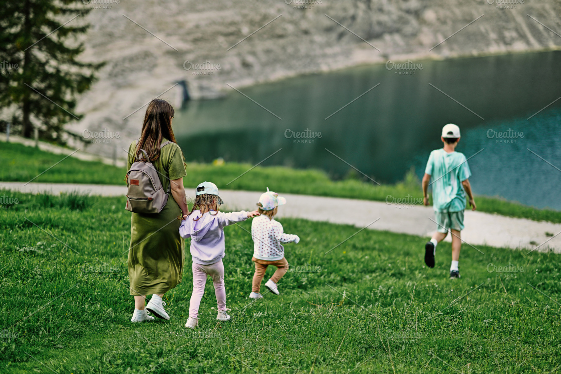 Mother with kids at Vorderer Gosausee, Gosau, Upper Austria., a Background Photo by AS photostudio