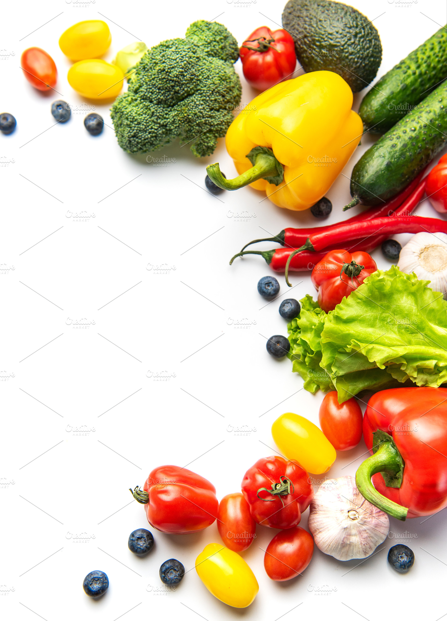 Fresh vibrant vegetables and fruits creating healthy eating bord, a Food & Drink Photo by Olena Rudo