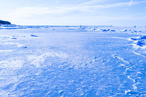 Frozen sea covered with ice, winter seascape