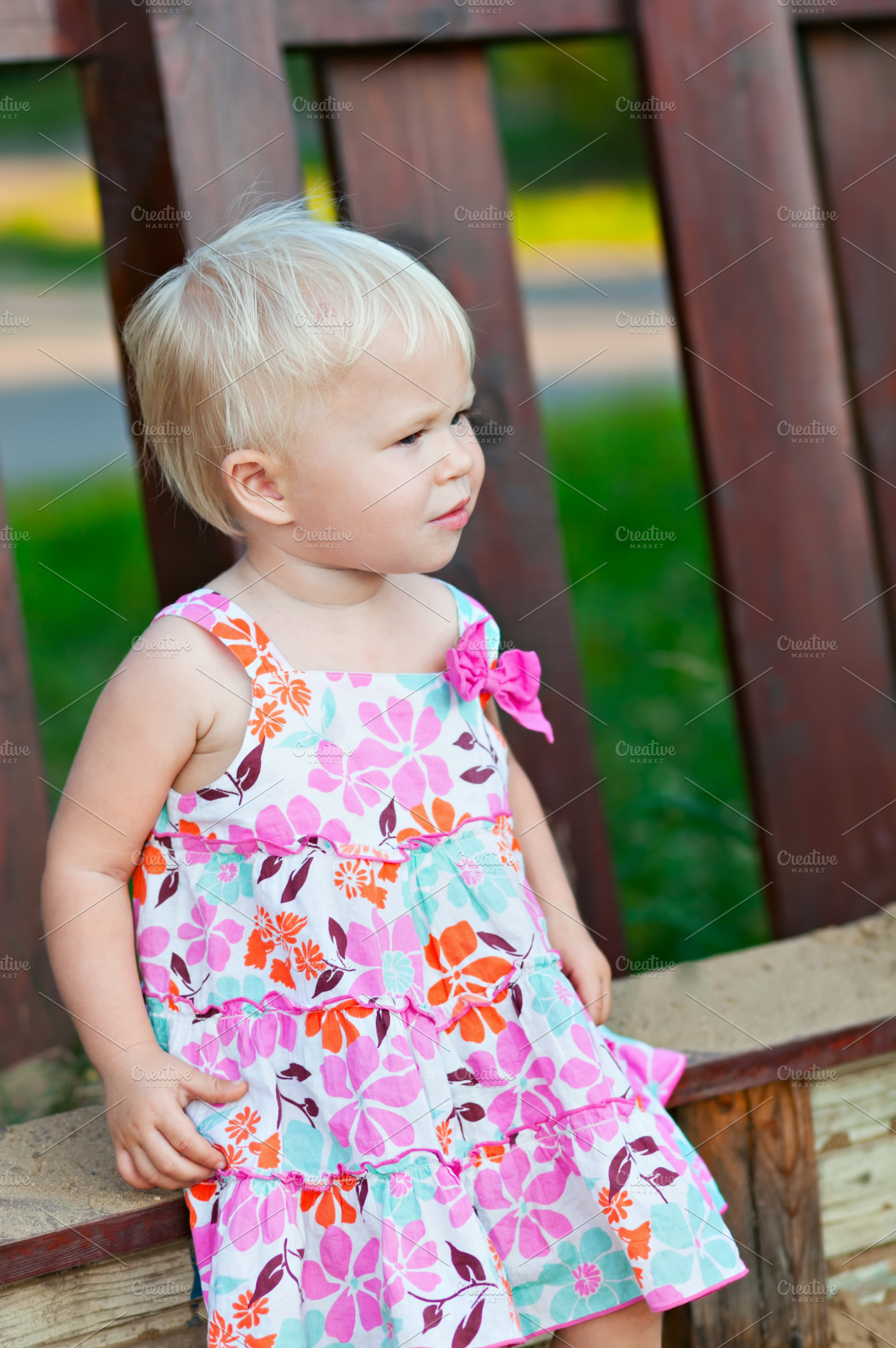 Baby girl sitting, a Photo by saiko3p