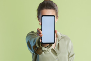Woman Hiding Face with Smartphone, a Business Photo by Alliance Images