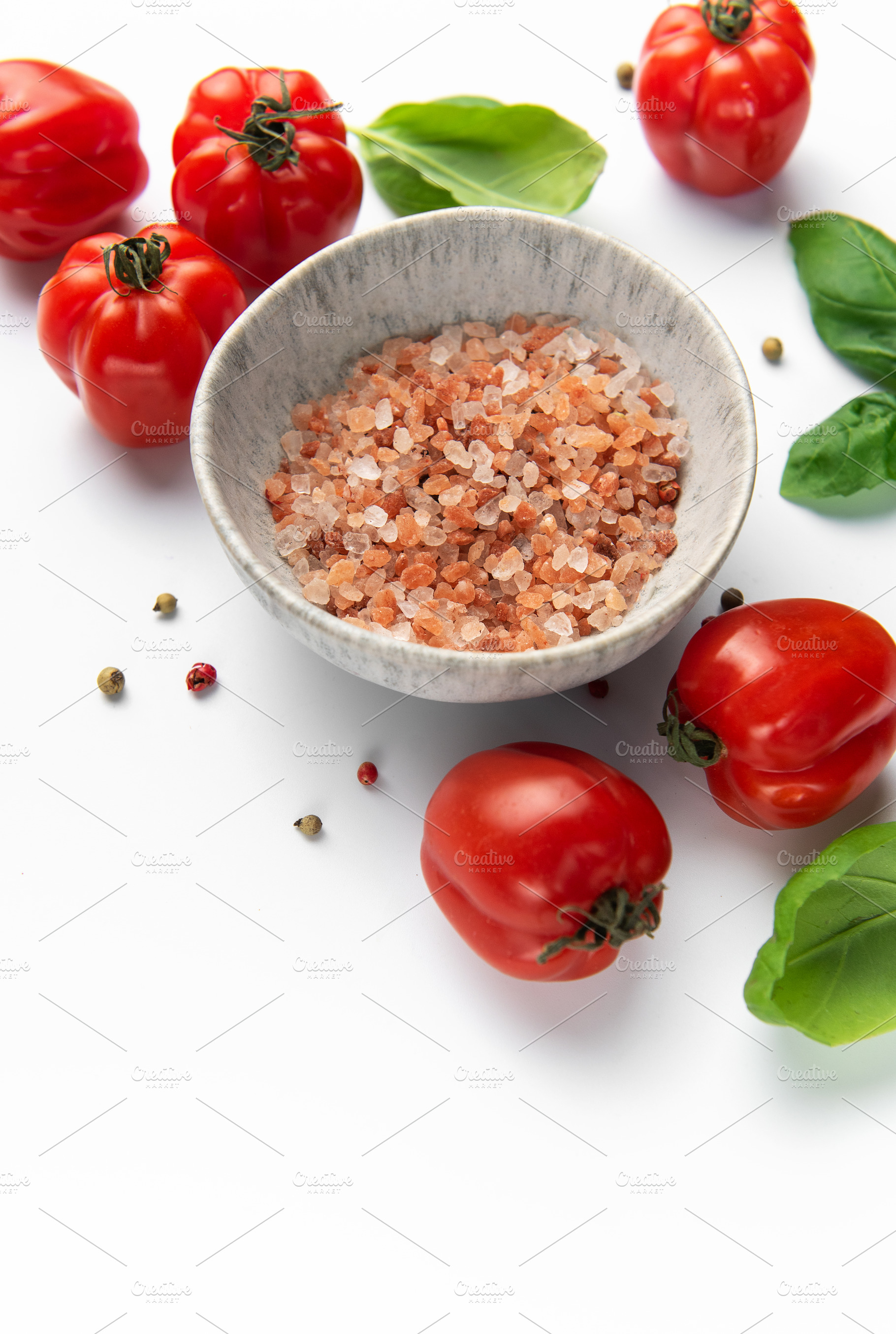 Himalayan pink salt, fresh tomatoes, and basil leaves on white b, a Food & Drink Photo by Olena Rudo