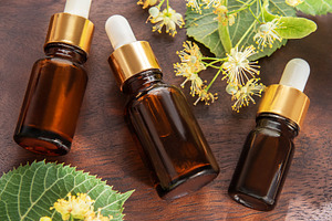 Linden essential oil dropper bottles for natural aromatherapy, a Health & Medical Photo by Olena Rudo