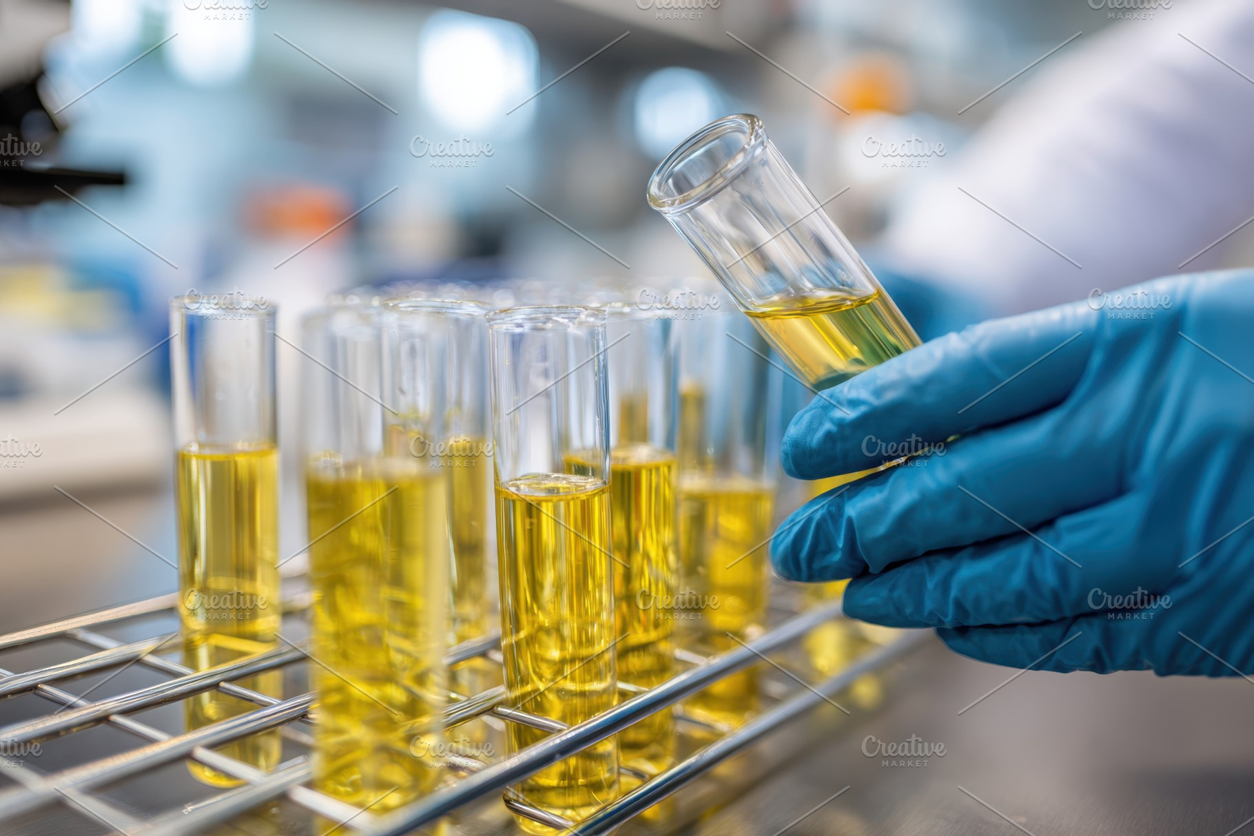 Laboratory test tubes with yellow liquid, a Health & Medical Photo by AlyaAnd