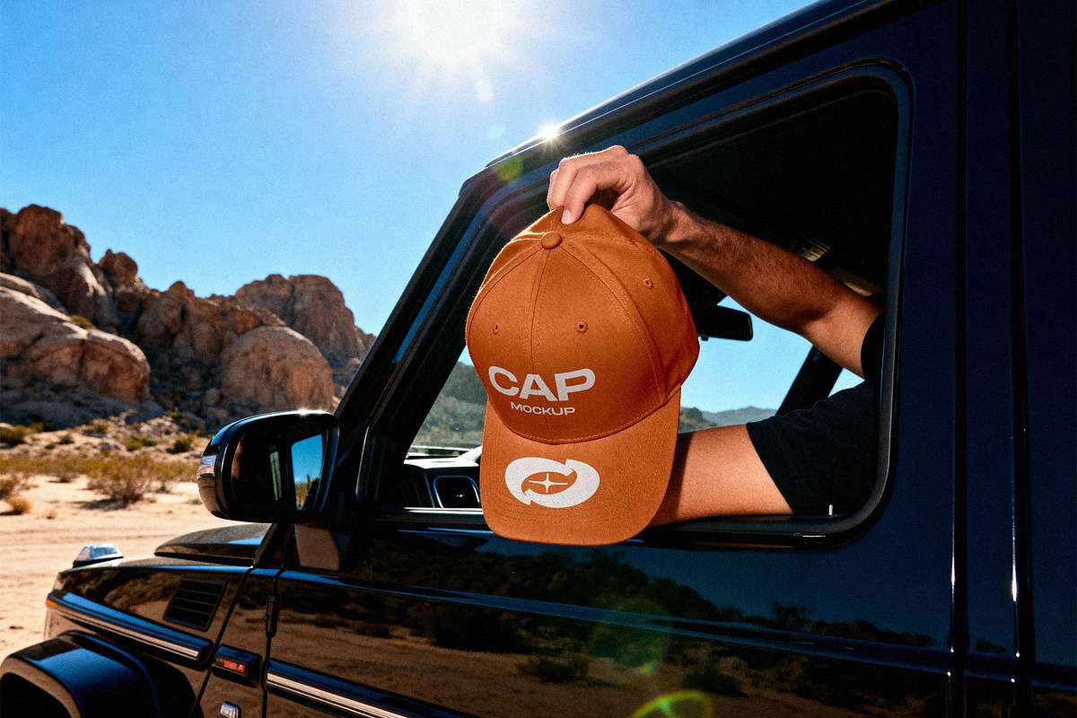Baseball Cap Mockup in Desert Road, a Hat Mockup by Design Squad (Photo 4 of 4)