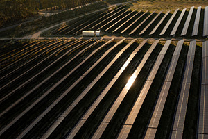 Rows of solar panels stretching across the landscape, a Photo by andreonegin market