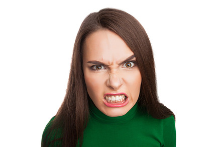 Woman in a green turtleneck stock photo containing color and green