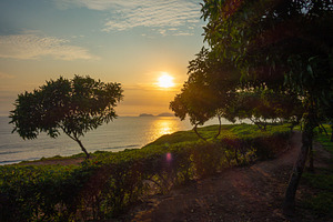 Sunset over the bay and Isla San Lorenzo in Lima, Peru, a Nature Photo by GoodGoods