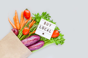 Fresh organic vegetables in craft shopping bag, a Food & Drink Photo by Dvoevnore photos