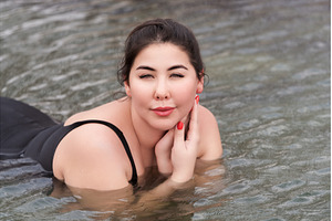 Outsize young brunette adult model, a Person Photo by Alexander-Piragis