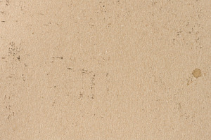 Texture of old brown kraft paper with spots and inclusions, a Background Photo by ndanko