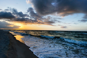 Sunset on a Florida Pensacola beach with waves rolling to shore and dramatic cl, a Nature Photo by AS photostudio