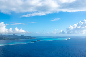 Aerial view of Tahaa island, French Polynesia, with turquoise la, a Photo by GoodGoods