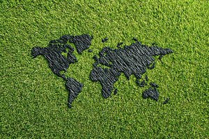 Artistic world map on green grass background, a Nature Photo by AlyaAnd