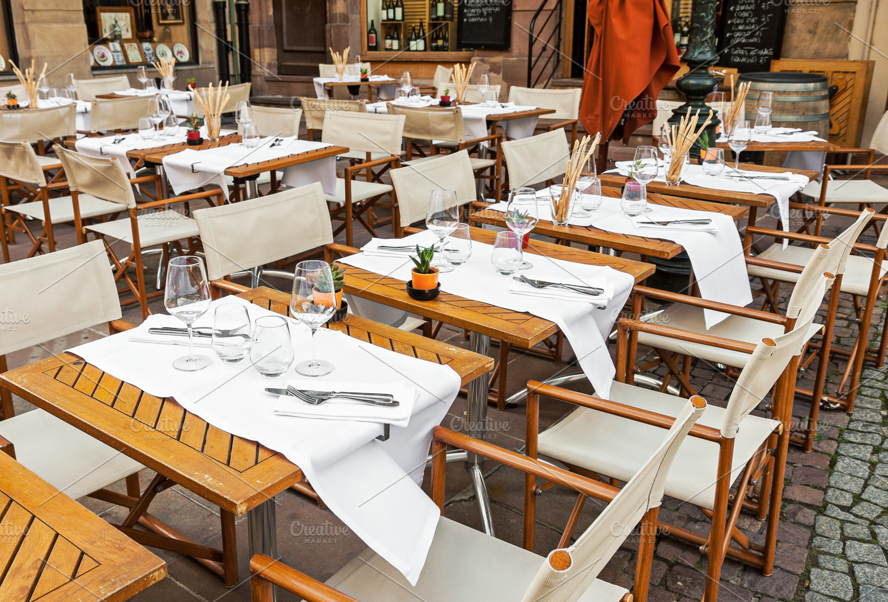 Empty restaurant with table set, a Food & Drink Photo by BOOCYS