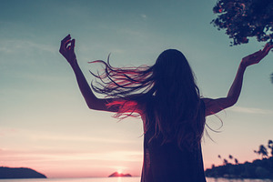 Sunset stock photo containing enjoying and outstretched