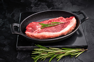 Premium raw striploin steak with rich color and texture, perfect, a Food & Drink Photo by composter-box@mail.ru
