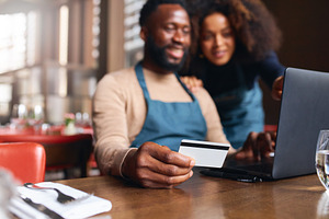 Restaurant owners working on finances