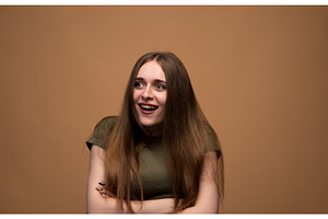 Young woman confidently smiling and, a Person Photo by volodymyrshtun13795
