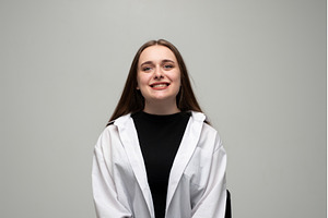Young woman smiling broadly, a Person Photo by volodymyrshtun13795