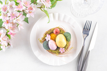 Easter holiday table setting with cutlery, a Holiday Photo by Rimma