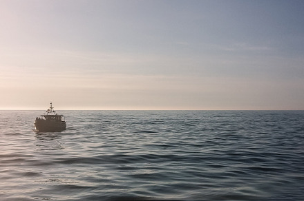 Lonely boat at sea