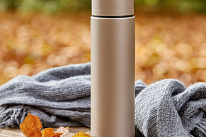 Cozy autumn scene with thermos and scarf, a Food & Drink Photo by AlyaAnd