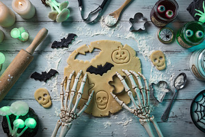 halloween, a skeleton cooking