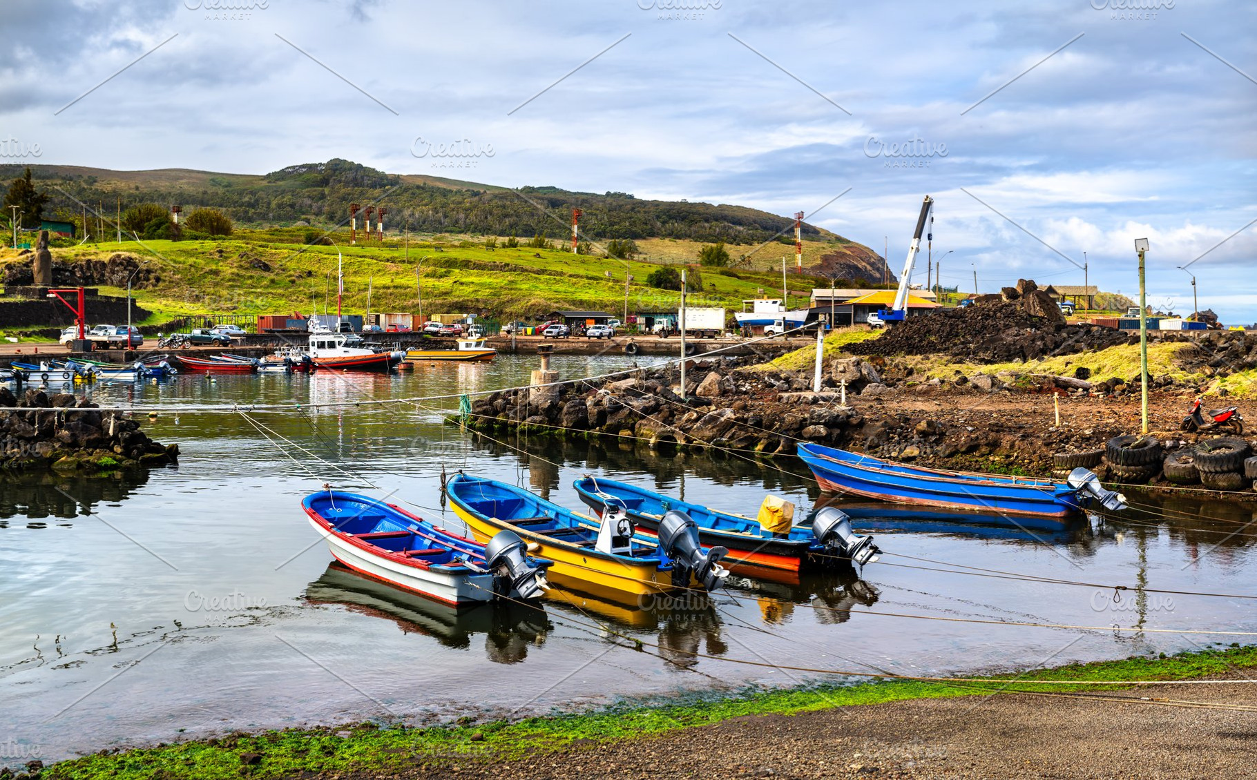 Colorful boats moored in Hanga Piko harbor on Easter Island Chile, a Transportation Photo by Leonid Andronov