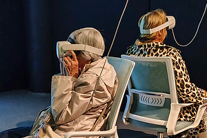 Two seniors woman using vr glasses at art exhibtion room, a Technology Photo by DanFLCreativo