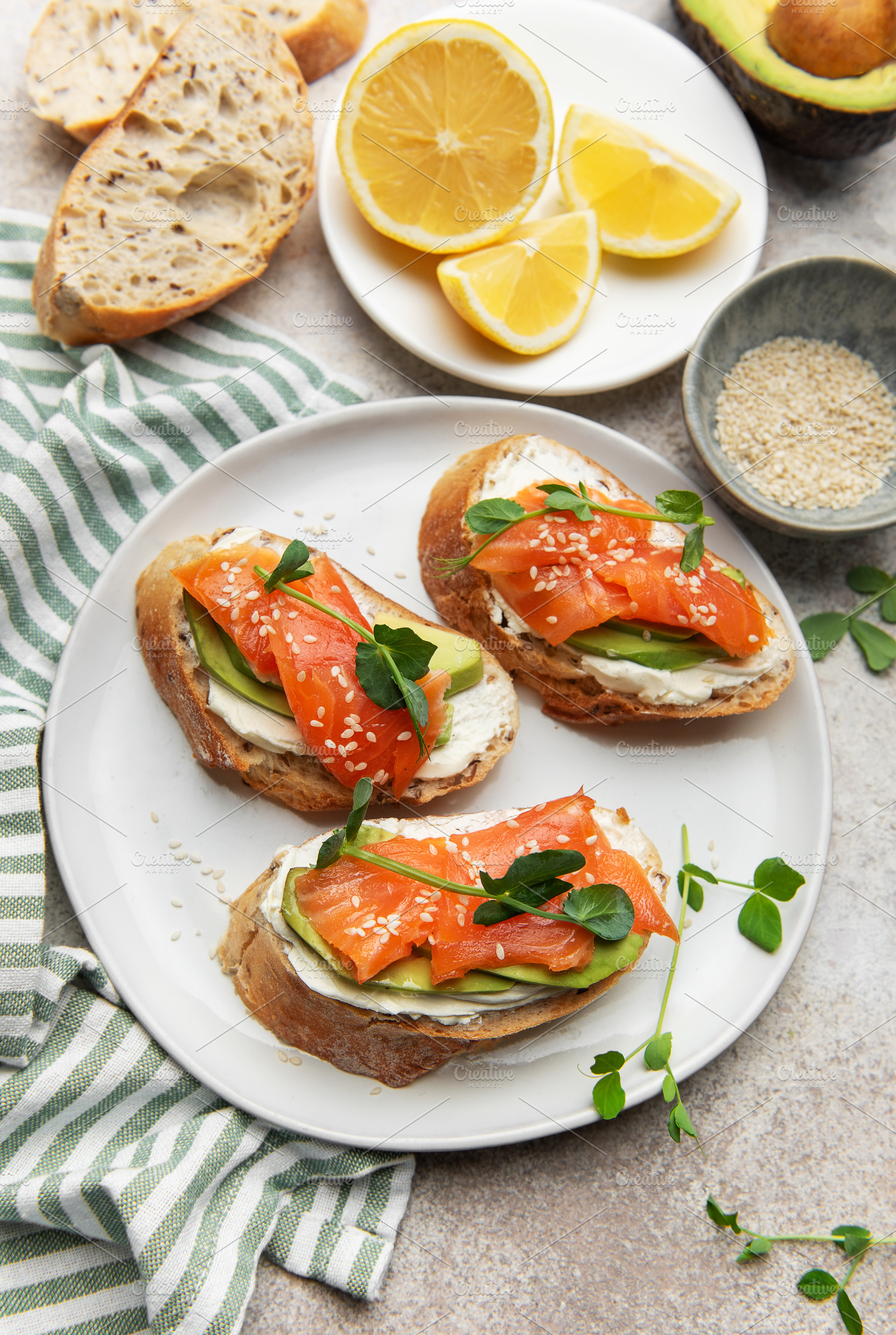 Bruschetta with salmon, avocado, and cream cheese, a Food & Drink Photo by Olena Rudo