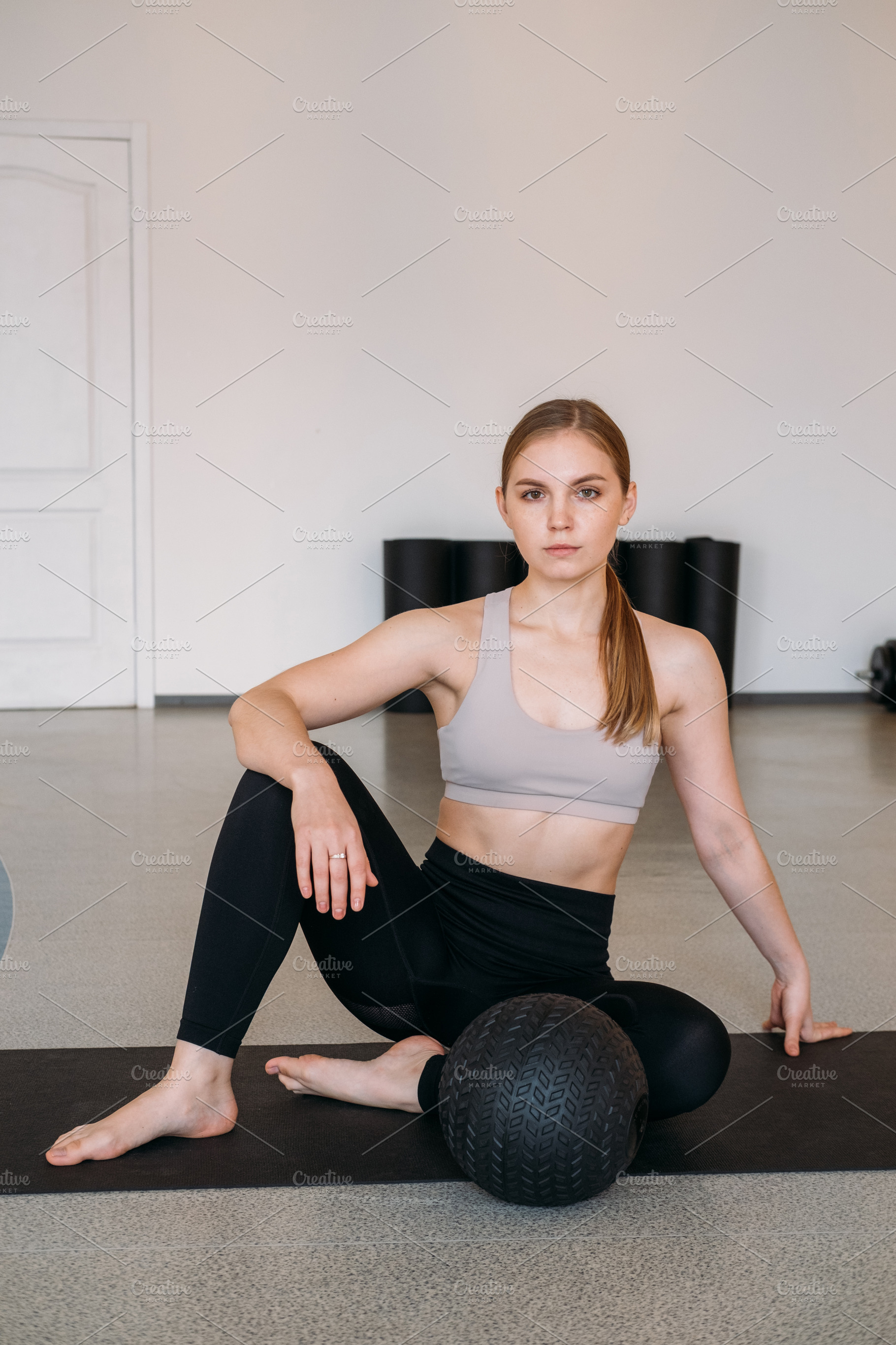 Athletic girl posing healthy lifestyle female ball, a Person Photo by Photo Drive Studio