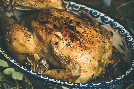 Whole roasted chicken with garlic stock photo containing chicken and roasted, a Food & Drink Photo by Foxys
