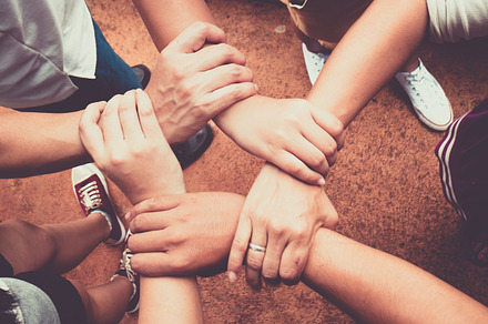 Concept of teamwork stock photo containing achievement and adult, a Person Photo by Guitarfoto Studio