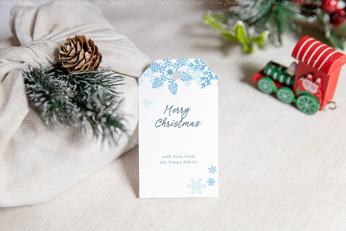 Christmas 2x3.5 Gift Tag Mockup, a Product Mockup by ILoveMockupDesign (Photo 7 of 11)