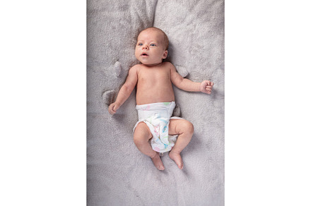 Pretty smiling baby girl and toy stock photo containing baby and childhood