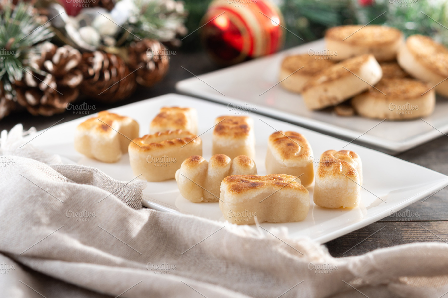 Traditional Spanish mantecados and marzipan dessert on wooden table, a Food & Drink Photo by etorres69