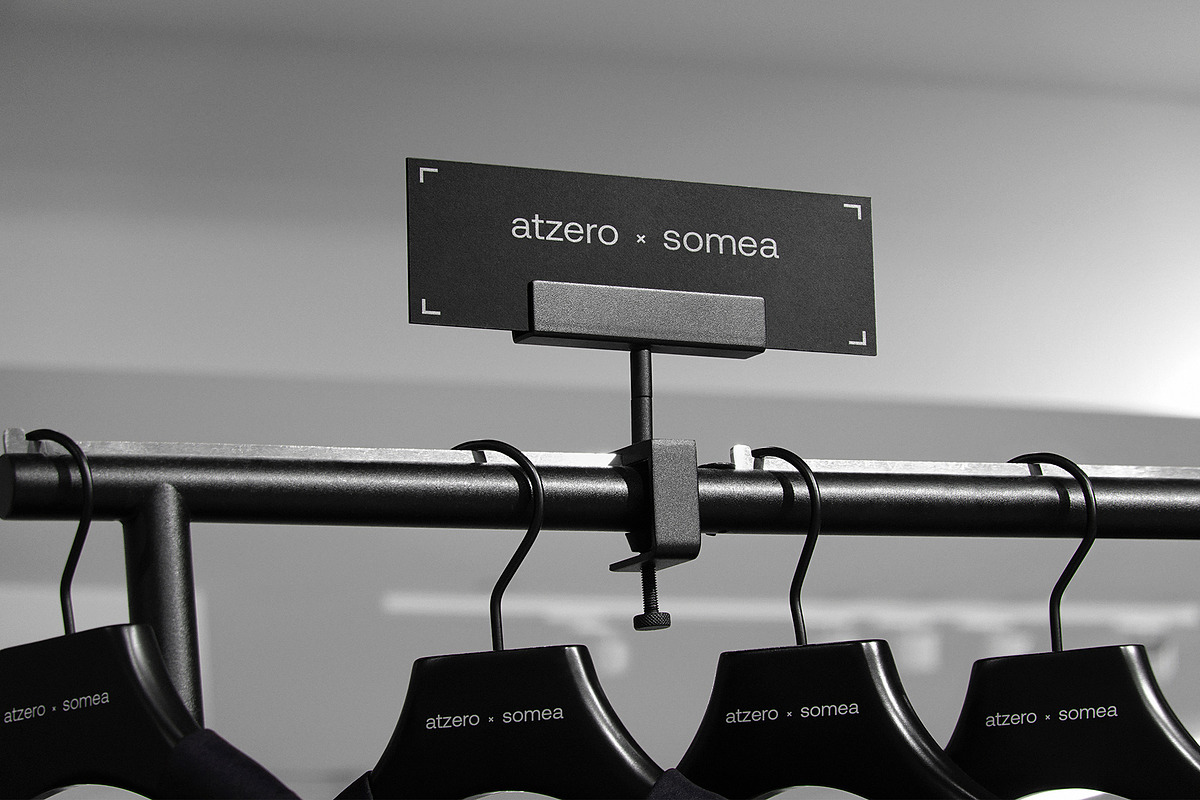 Logo Mockup Clothing Hanger Sign, a Product Mockup by Asylab (Photo 1 of 5)