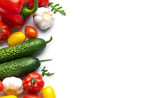 Fresh organic vegetables and spices creating a border, a Food & Drink Photo by Olena Rudo