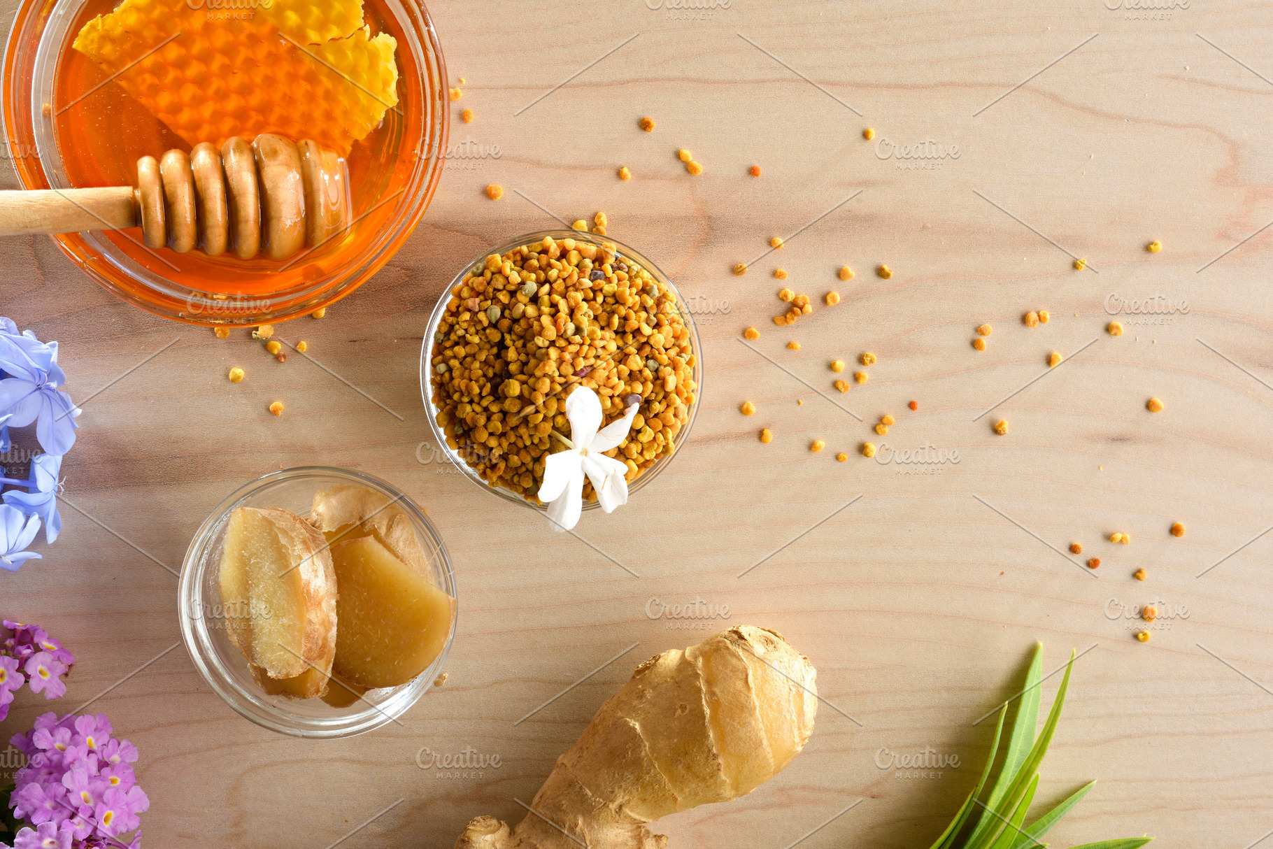 Natural healing products such as ginger hone  and pollen top, a Food & Drink Photo by Davizro's Market