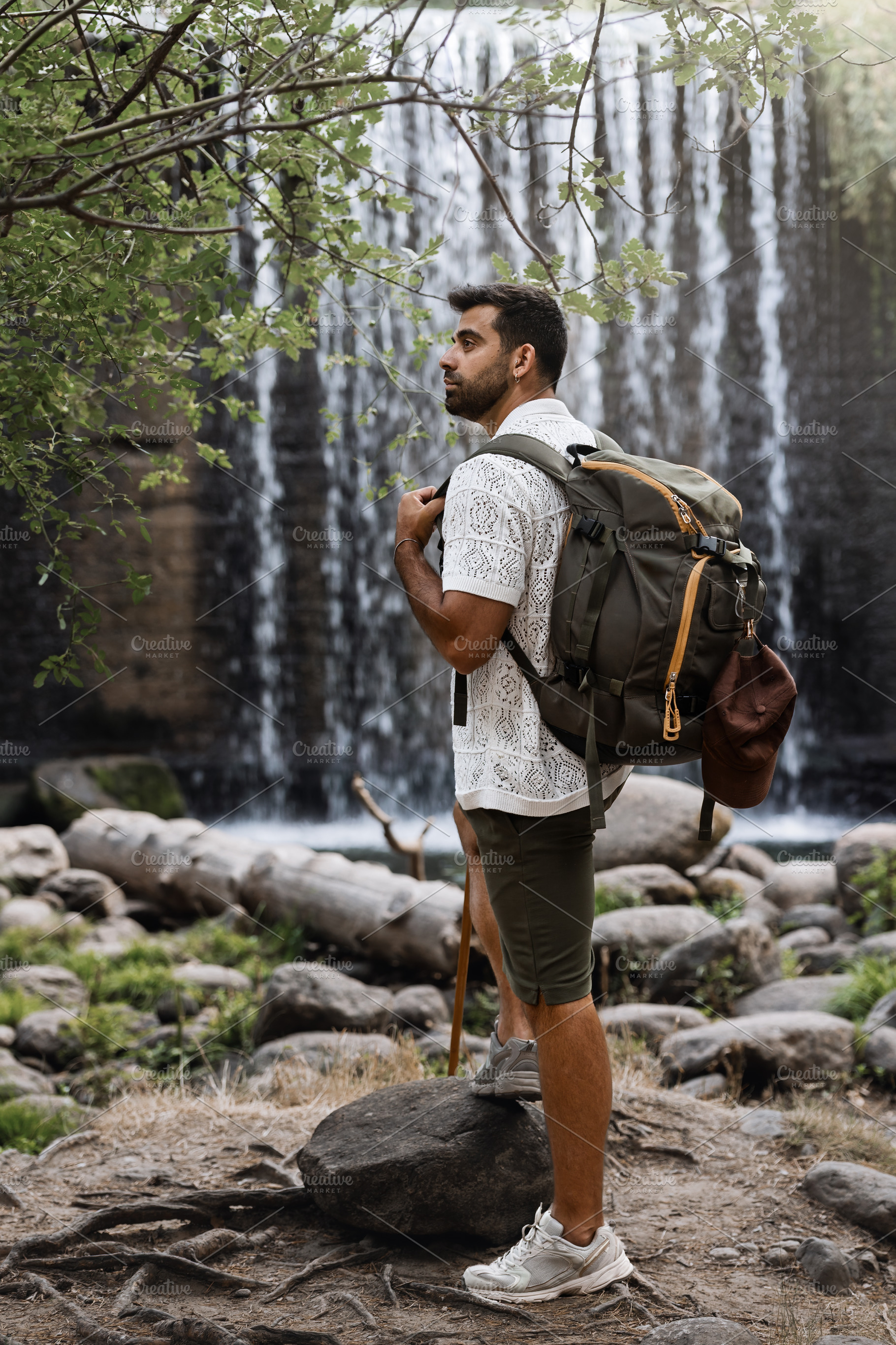 Hiker observing waterfall with backp, a Sports & Recreation Photo by Perpis