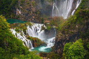 Big waterfalls in the green forest, a Nature Photo by Alpine Dreams
