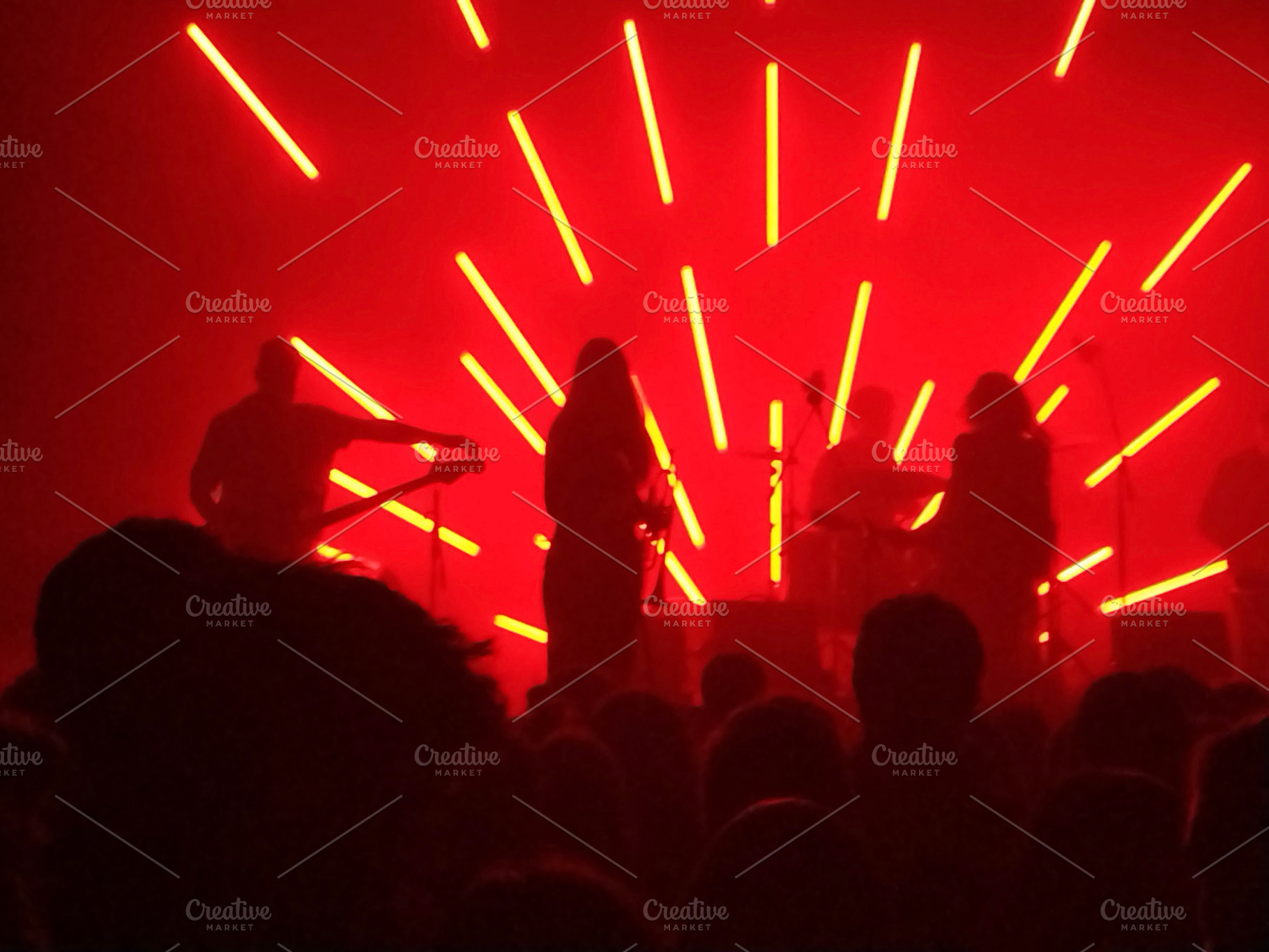 Live band on stage with radial light beams, an Arts & Entertainment Photo by DanFLCreativo