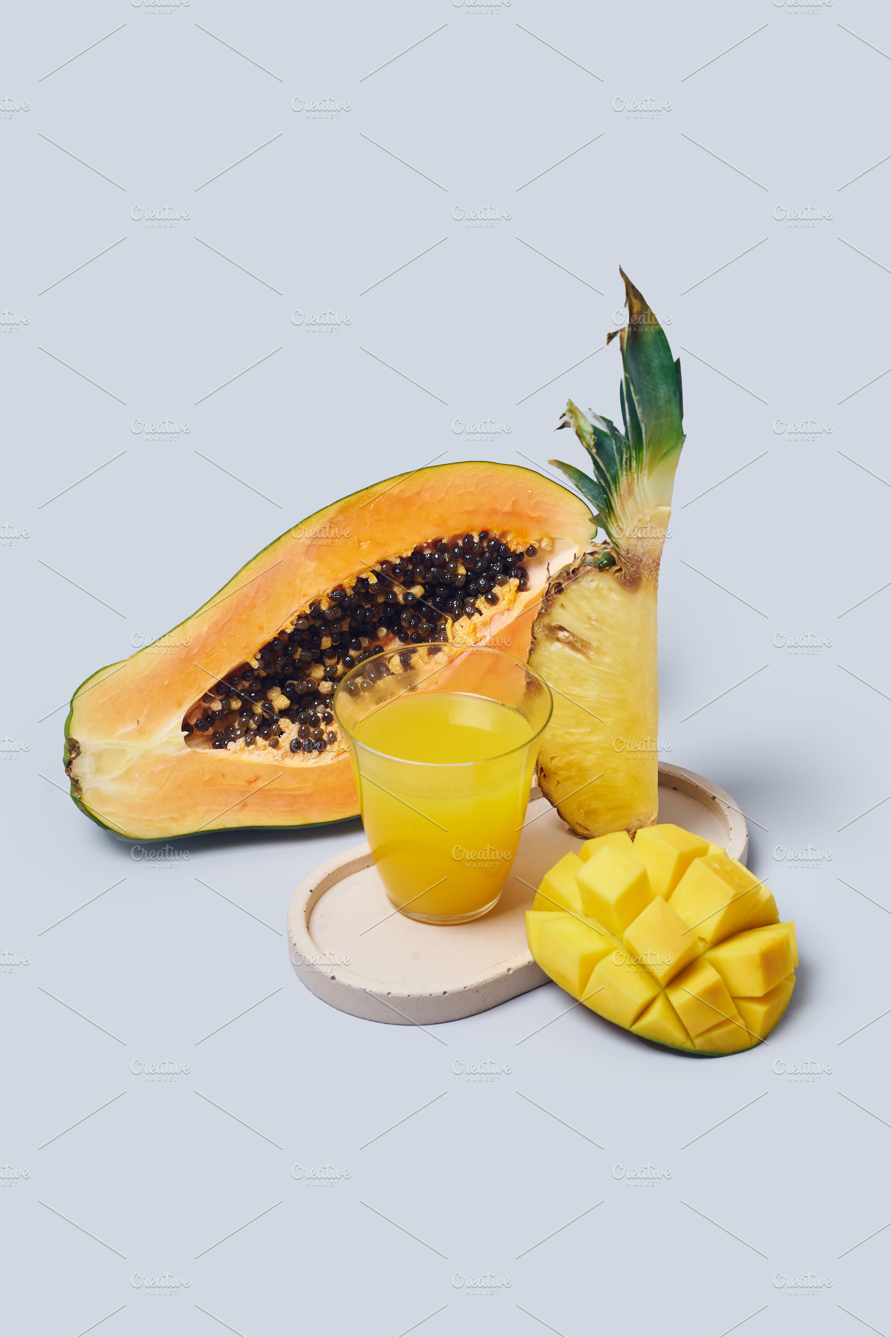 Tropical fruits variety on a colorful background. Side view with, a Food & Drink Photo by Asya Nurullina