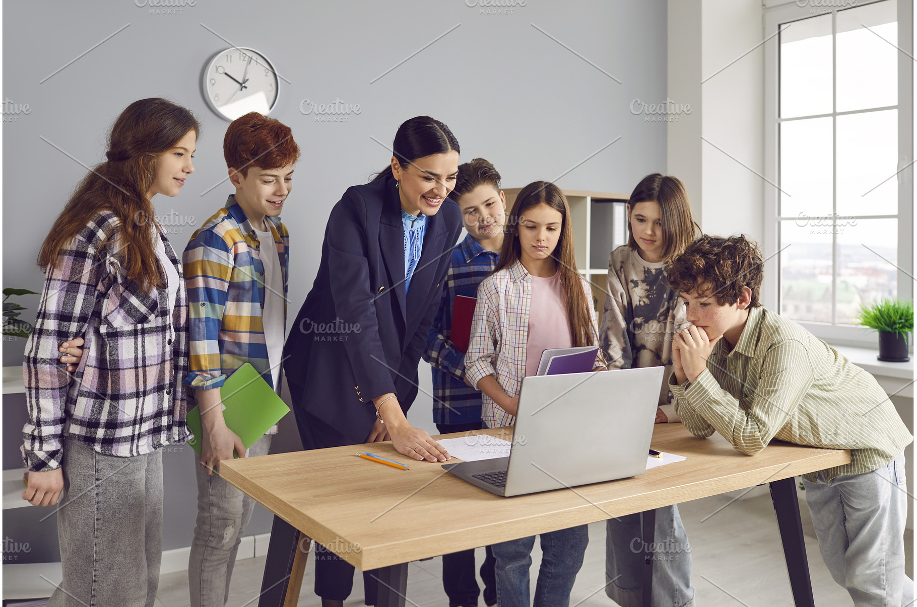 Group of classmates standing in, a School & Education Photo by StudioRomantic